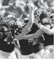  ?? SAM CRAFT/AP ?? Texas A&M kicker Seth Small (47) celebrates his game-winning field goal with teammates.