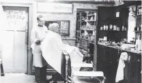  ?? PHOTO: SOUTH CANTERBURY MUSEUM 7802 ?? The Boyhood Barber . . . The saloon at Clark’s barber shop in Timaru about 1960.