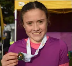  ??  ?? Claragh Keane of D.M.P. with her gold team medal.