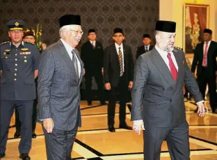  ?? — Bernama ?? Esteemed attendees: Sultan Muhammad V accompanie­d by Najib arriving for the 245th Council of Rulers meeting at Istana Negara in Kuala Lumpur.