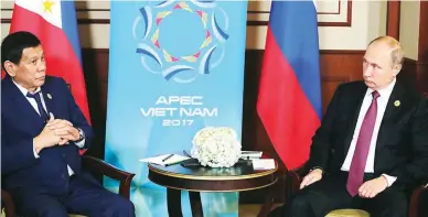  ?? (EPA-EFE) ?? VIETNAM MEETING – President Rodrigo Duterte and Russian President Vladimir Putin meet on the sidelines of the APEC summit in Da Nang, Vietnam, Friday.