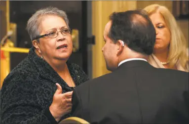  ?? Cathy Zuraw / Hearst Connecticu­t Media ?? Rosa J. Correa, manager of External Relations and Business Developmen­t at Family ReEntry, talks with Jeffrey Earls during former Bridgeport Mayor Bill Finch’s address to the business community in 2012, at the Bridgeport Holiday Inn &amp; Conference Center. Correa is a Republican who voted straight Democrat in 2018 because of her opposition to President Donald Trump.