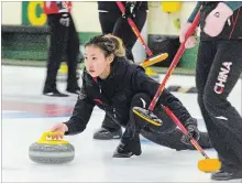  ?? LUKE EDWARDS NIAGARA THIS WEEK ?? Jiayi Jiang, vice for the Chinese national under-21 women's curling team, releases a rock during an exhibition game against the Brock University women’s team Sunday at St. Catharines Golf and Country Club.