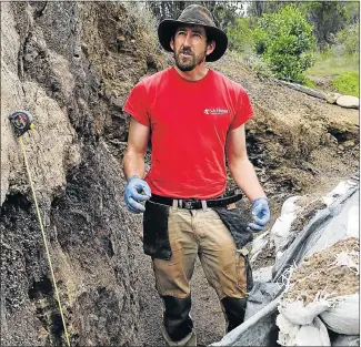  ?? Pictures: WERNER HILLS ?? ANCIENT TOOL FACTORY: Dr Matt Meredith-Williams excavates where some of the hand axes and pieces of wood were found