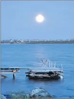  ?? PAUL SMITH PHOTO ?? A big moon shines over my wharf.