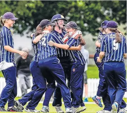  ?? PHOTO: ADAM GAIN ?? That winning feeling . . . St Hilda’s Collegiate pupils (from left) Megan Meltzer, Emma Black (obscured) Olivia Hall, Olivia Gain, Eden Carson, Molly Loe (obscured) and Summer Phillips celebrate after beating Christchur­ch Girls’ High School in the final of the national girls secondary schools championsh­ips on Wednesday.