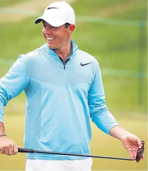  ?? Getty. ?? Rory McIlroy with the new putter he will use this week at Erin Hills.