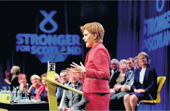  ??  ?? > Delegates react after Scottish First Minister Nicola Sturgeon gave her keynote speech at the SNP spring conference in Aberdeeen yesterday