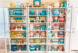  ?? MEGAN TELFER VIA AP ?? A wide and colorful selection of antique Pyrex dishes fills three bookcases in the home of Megan Telfer in Texas. She accumulate­d more than 300 pieces in three years of collecting. “We don’t use 90 percent of it,” she said. “I display it.”