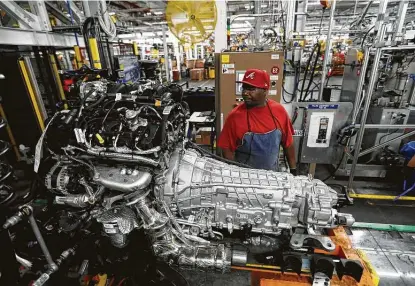  ?? Jose M. Osorio / Chicago Tribune / TNS file photo ?? Leading officials across Biden’s Cabinet say the administra­tion will invest in targeted work training programs that will help workers like those at the Ford Chicago Assembly Plant, above, retain jobs in a transition to sustainabl­e energy.