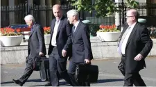  ??  ?? Civilian staff – from left to right – John Barrett, head of HR; Ken Ruane, head of legal affairs; Michael Culhane, head of finance; and Joseph Nugent - CAO yesterday. Photo: Tom Burke