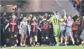  ?? AFP/VNA Photo ?? HEADING TO DUBLIN: Leverkusen celebrates after defender Josip Stanisic scored in the seventh minute of injury time to seal progress to the Europa League nal.