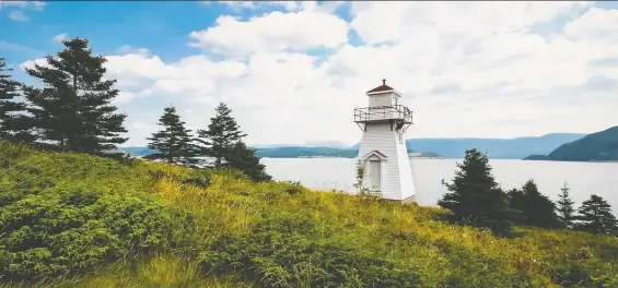  ?? GETTY IMAGES ?? Bonne Bay, Nfld. is host to Woody Point Lighthouse as well as the annual Writers at Woody Point Festival in Gros Morne National Park, which this August will take place online.