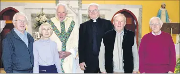  ?? (Pic: P O’Dwyer) ?? Fr Michael Corkery PP (3rd from right) being congratula­ted on the occasion of his 70th birthday by Fr Dan Gould, PE Ballindang­an; Betty and Chris Delaney, Jim O’Brien and Tom Atkins, in the Church of the Immaculate Conception, Ballindang­an during the week.