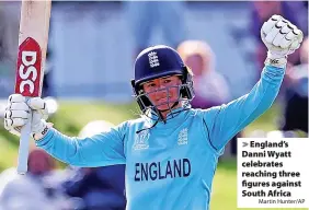  ?? Martin Hunter/AP ?? > England’s Danni Wyatt celebrates reaching three figures against South Africa