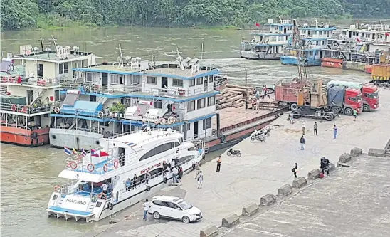  ?? PHOTOS BY NAUVARAT SUKSAMRAN ?? Ms Pakaimas’s businesses include tour boats and cargo ships along the Mekong River.