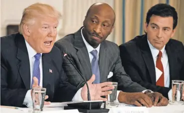  ?? EVAN VUCCI, AP ?? President Trumpmeets withMerck CEO Ken Frazier, center, and other execs at the White House in February. Trump sent an angry tweet after Frazier resigned from the council.