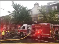  ?? PHOTO COURTESY OF LANSDALE BOROUGH POLICE DEPARTMENT ?? Fairmount Fire Company firefighte­rs respond to a fire in an apartment on the 100 block of Walnut Street on Sunday, May 5, 2019.