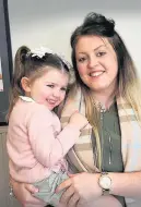  ??  ?? All smiles Wee Isla Fitzsimmon­s with mum Kirstin Conn