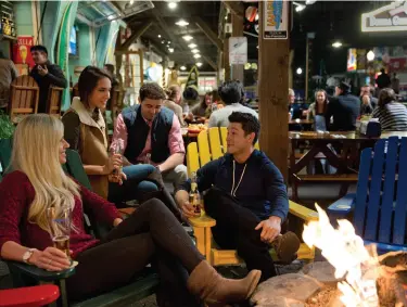  ??  ?? ENJOYING AN ALFRESCO BEVERAGE and fire with friends at Pier 39, below; Moon Festival in San Francisco’s Chinatown, the largest Chinese community outside Asia, opposite.