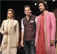  ??  ?? ( Right) Aditi Rao Hydari, Raghavendr­a Rathore and Ali Afzal; ( left and below) Models showcase designer Raghavendr­a Rathore’s collection at IBW