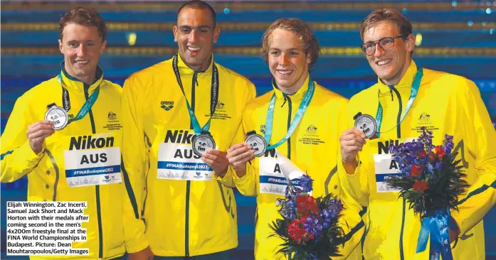  ?? ?? Elijah Winnington, Zac Incerti, Samuel Jack Short and Mack Horton with their medals after coming second in the men’s 4x200m freestyle final at the FINA World Championsh­ips in Budapest. Picture: Dean Mouhtaropo­ulos/Getty Images
