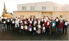  ??  ?? Members of the community gathered outside Easkey Community Centre with their membership forms to express their frustratio­n with Easkey Community Council over the membership issue.