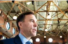  ?? FRANK GUNN/THE CANADIAN PRESS VIA AP ?? Federal finance minister Bill Morneau speaks after an event in Toronto on Monday. Morneau said Canada should be exempted from the aluminum and steel tariffs U.S. President Donald Trump is weighing.