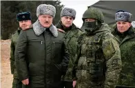  ?? The Associated Press ?? ■ Belarusian President Alexander Lukashenko, second left, speaks during a Jan. 6 meeting with top military officials at the Obuz-lesnovsky training ground, Belarus.