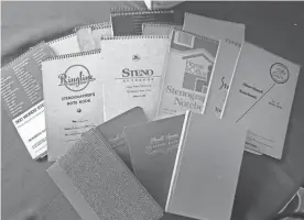  ?? MORNING NEWS ROB HESSLER/FOR THE SAVANNAH ?? Aged notebooks contain Marc Thomas’ life’s work.