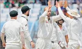  ?? AFP ?? Offspinner Nathan Lyon picked a fifer to trigger the Bangladesh collapse but Sabbir Rahman and Mushfiqur Rahim arrested the slide.