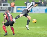  ??  ?? Flying winger: Elgin’s Conor O’Keefe, right