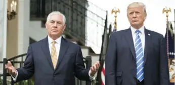  ?? JIM WATSON/AFP/GETTY IMAGES ?? U.S. President Donald Trump, alongside Secretary of State Rex Tillerson, said Friday that he was considerin­g options involving the U.S. military as a response to the escalating political crisis in Venezuela.
