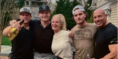  ?? COURTESY OF THE LAUBE FAMILY ?? Dylan Laube (second from left) celebrates being drafted by the Raiders with his family.