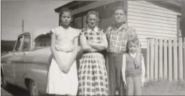  ?? Thank you Burton Janes ?? This is a photo of the Snow family of Clarke's Beach - L-R: Ruby, Pearl, Walter Sr., Walter Jr. Background - 1955 Plymouth. Walt Snow's wellknown barbershop is shown in the background. Photo taken in 1959. Credit: Walter Snow