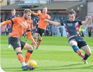  ??  ?? Dundee United’s Pavol Safranko has an attempt at goal