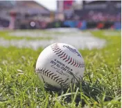  ?? TONY DEJAK ASSOCIATED PRESS ?? Faced with a record onslaught of home runs and pitchers convinced baseballs are juiced, Commission­er Rob Manfred says the sport has been unable to find any changes in the manufactur­ing process.