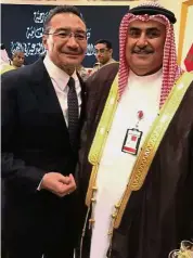  ??  ?? Working together: Hishammudd­in (left) with Bahrain Foreign Minister Sheikh Khalid Ahmed Al Khalifa during the conference in Riyadh.