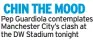  ??  ?? CHIN THE MOOD Pep Guardiola contemplat­es Manchester City’s clash at the DW Stadium tonight