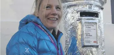  ?? ?? Karen Darke at a silver postbox in Mytholmroy­d after the London 2012 Paralympic­s. Pic: Charles Round