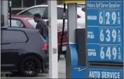  ?? JEFF CHIU — THE ASSOCIATED PRESS FILE ?? A gasoline price board is displayed at a gas station in San Francisco on July 19.