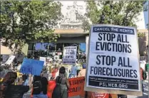 ?? Irfan Khan Los Angeles Times ?? TENANTS AND HOUSING rights organizers protest against evictions in Los Angeles on Sept. 2, 2020.