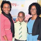  ??  ?? Joel Barnett celebrates with aunt Dillette HopeWebb (left) and mother Dawn Hope-Barrett.