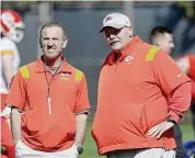  ?? Christian Petersen/Getty Images ?? Kansas City Chiefs defensive coordinato­r Steve Spagnuolo, left, talks with coach Andy Reid in a practice session prior to Super Bowl LVII at Arizona State University Practice Facility on Thursday in Tempe, Ariz.