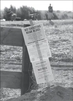  ?? Buy this photo at YumaSun.com FILE PHOTO BY RANDY HOEFT/YUMA SUN ?? IT IS IMPORTANT FOR HUNTERS TO READ ALL of the posted signs and follow all of the rules during the dove hunt season, which gets under way Saturday morning.