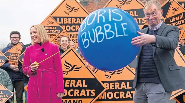  ?? ?? SHOCK: New Liberal Democrat MP Helen Morgan, bursts “Boris’s bubble” held by colleague Tim Farron, as she celebrates her by-election win.