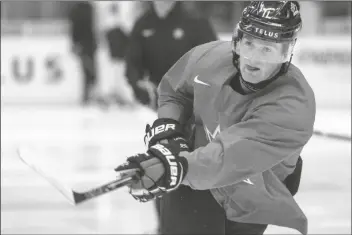  ?? ASSOCIATED PRESS ?? IN THIS JAN. 1 FILE PHOTO, Canada’s Alexis Lafreniere shoots during the team’s practice at the World Junior Hockey Championsh­ips in Ostrava, Czech Republic.