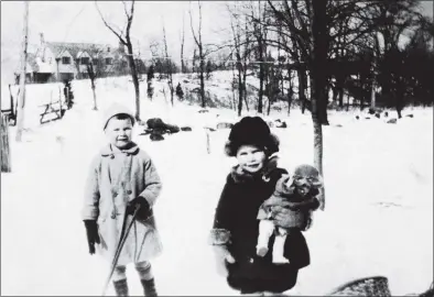  ?? Associated Press / Contribute­d photo ?? George H.W. Bush with his only sister, Nancy, when he was 5 years old in 1929.