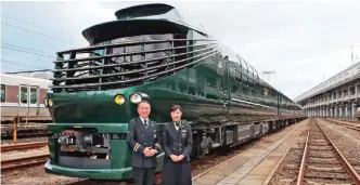  ??  ?? Japan's latest super-deluxe cruise train "Twilight Express Mizukaze" during its press preview in Osaka.