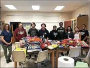  ??  ?? Halloween treats collected for the Salvation Army, senior center, Operation Backpack and PEAK.